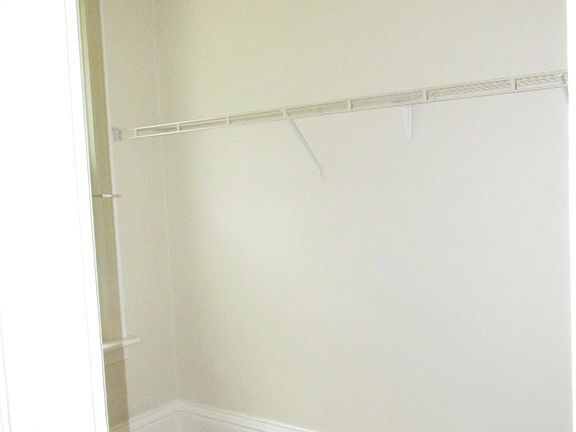 Master bedroom walk in closet.