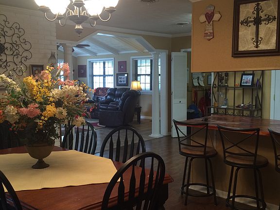 Open dining, kitchen, den. 