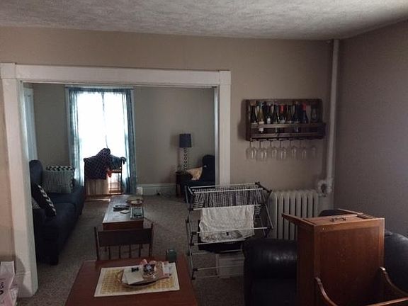 Living room and extra activity room in back or 3rd bedroom.