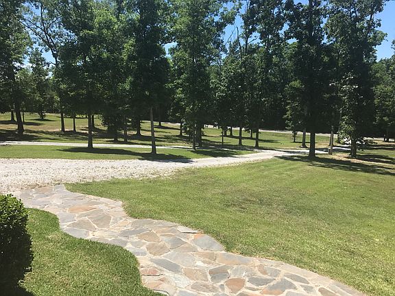 Groomed land w/mature trees