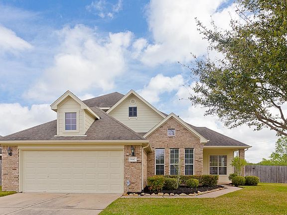 Notice the double wide driveway.