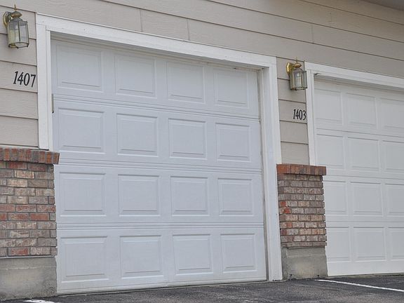 Attached garage provides direct, protected entry into living space.