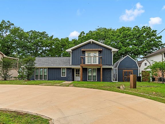 Street Side View with circle driveway with plenty of parking!