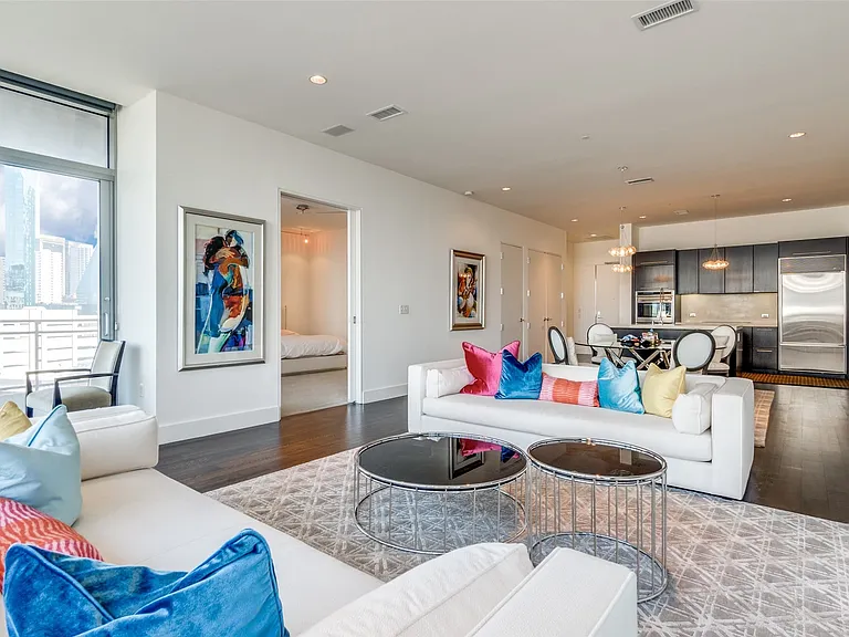 Living room featuring wood finished floors and recessed lighting