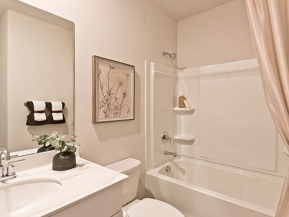 Downstairs full bedroom and bathroom are perfect for guest suite.