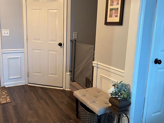 Foyer leading to rec room above garage