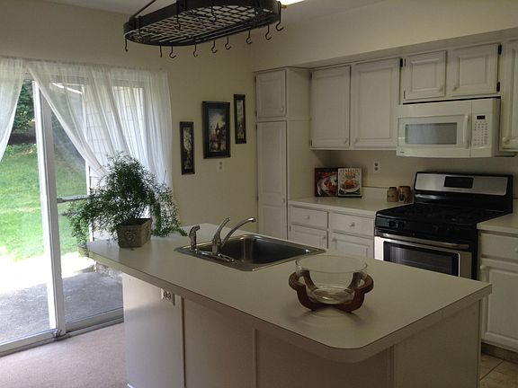 Kitchen- which is spacious with new appliances and an island