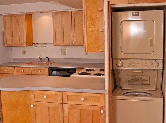Stacked washer and dryer.