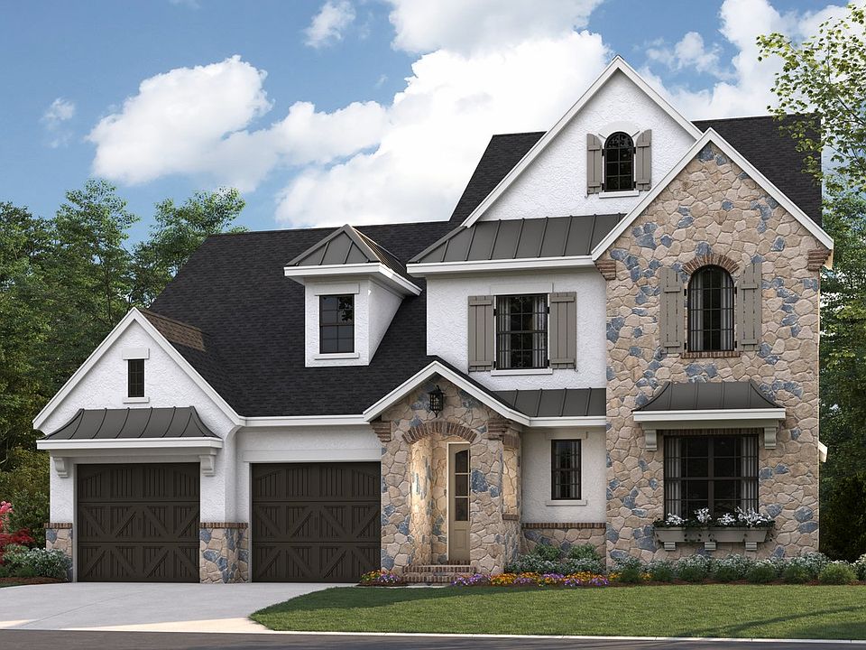 Marin Expanded - French Cottage c 2-Car Front Load Garage Note Renderings may show optional f