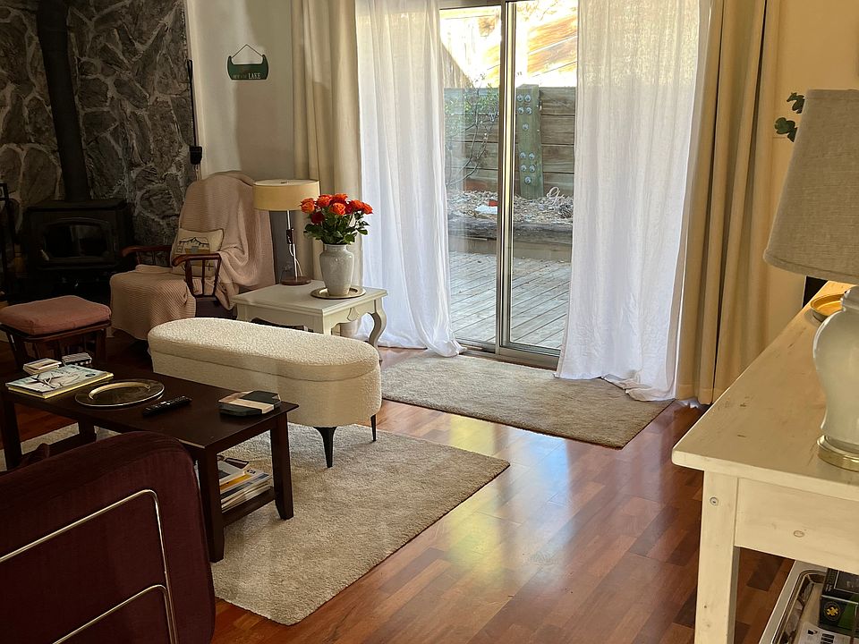 Living room with wooden stove -direct access to the patio