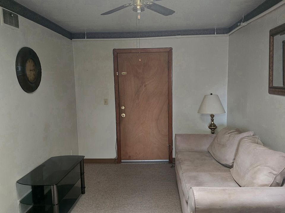Large Living room with Sofa, Chair, Desk, TV Stand and Lamp