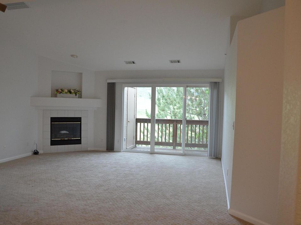 Living room and deck as seen from front door.