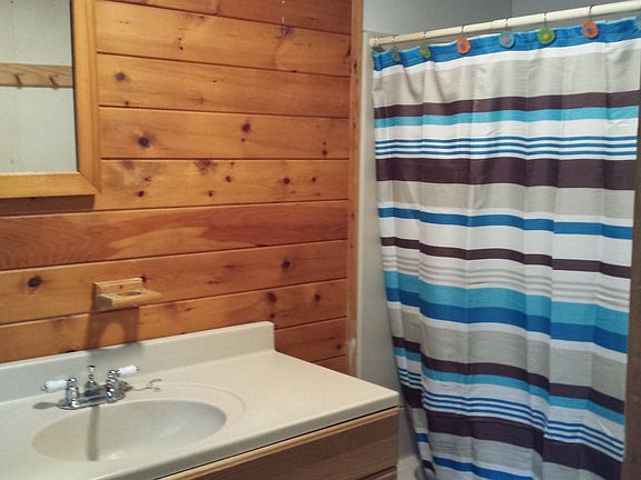 Bathroom with tub and shower