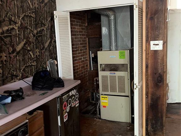 5th image of 7116 S Broadway