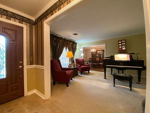 Foyer opens to living room