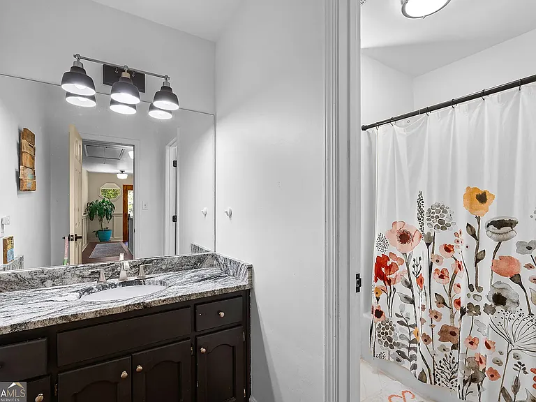 Second floor full bathroom with separated shower and toilet