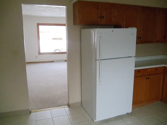 KITCHEN LOOKING INTO LIVINGROOM