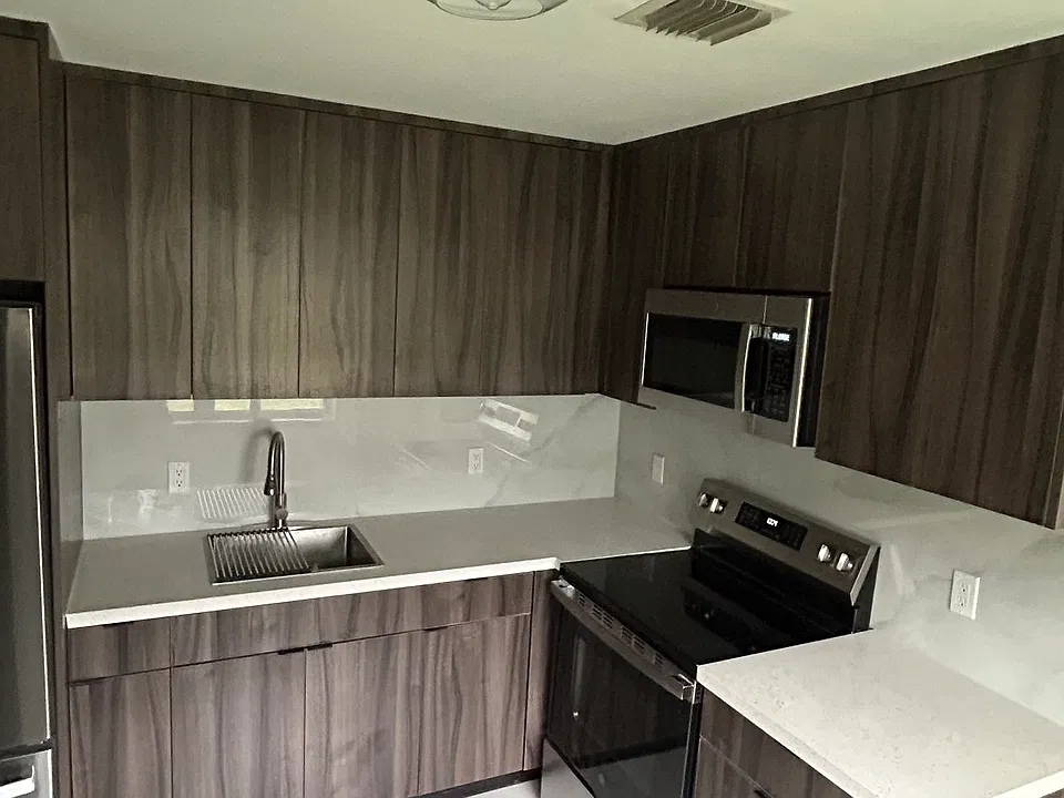 Brand new kitchen (cabinetry, countertops, appliances, and backsplash)