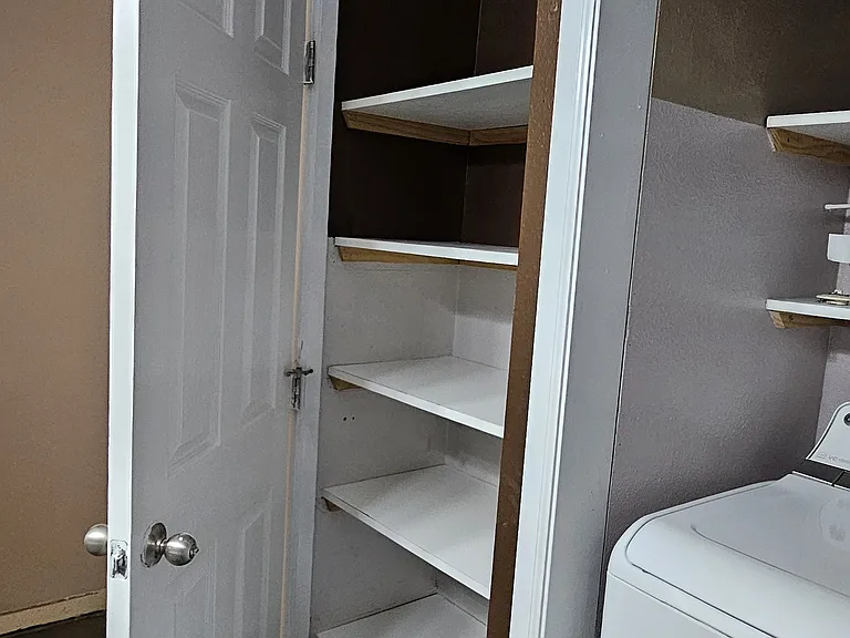 Linen closet in bathroom