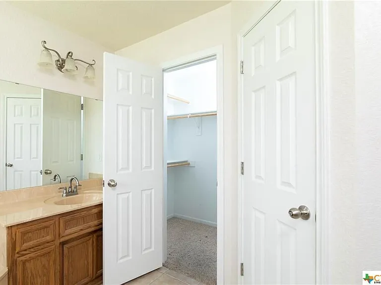 Large walk-in closets in master bath area
