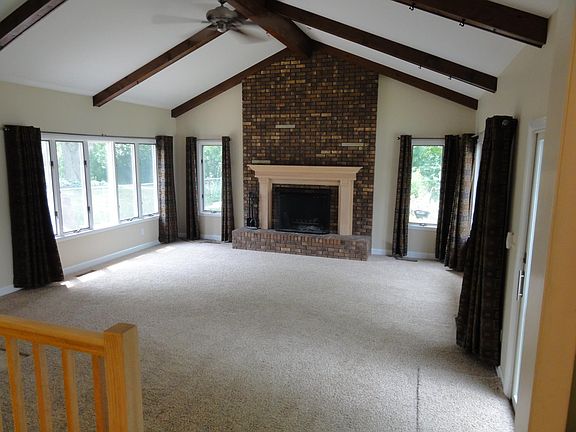 400 sq ft family room with 12 ft cathedral ceilings and woo