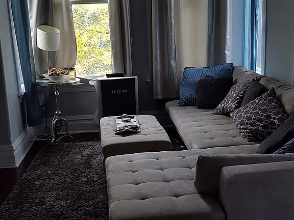 Living room flooded w/ light