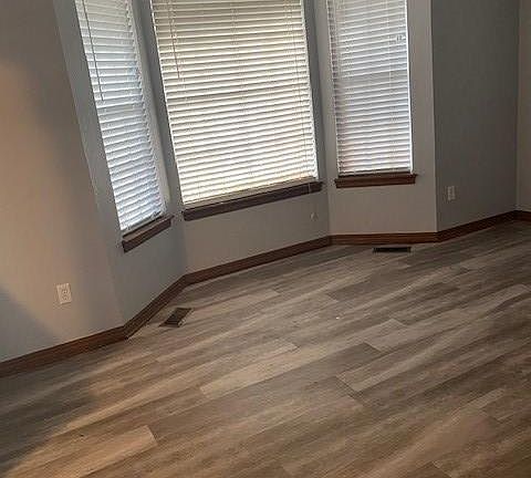 Living room with front bay window