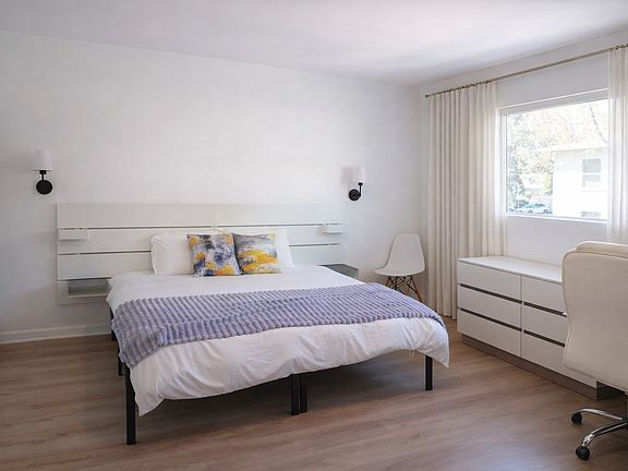 Bedroom with Its Own Private Bathroom and Home Office Setup