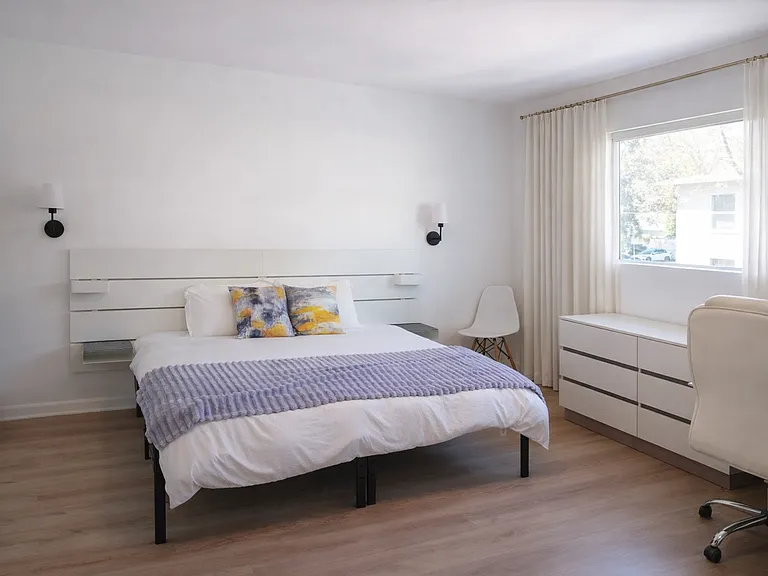 Bedroom with Its Own Private Bathroom and Home Office Setup