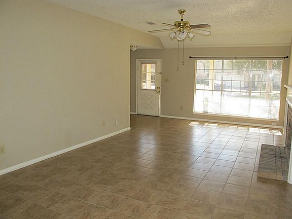 The tile floors were just replaced. They flow through the entry way and den to the kitchen.