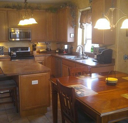 Kitchen
						:
						Large eat-in area for 6, plus 2 seats at island + separate dining room (8-10)