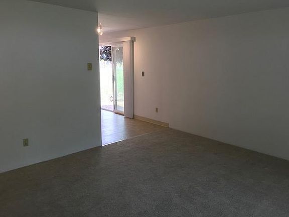 living room with no carpeting