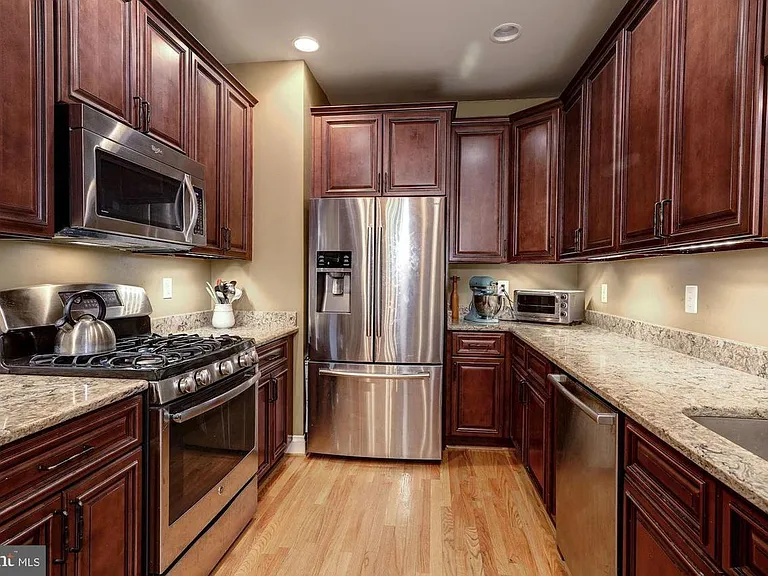 Renovated kitchen, stainless steel appliances, granite countertops