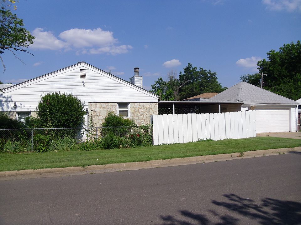 Garage with Covered Patio