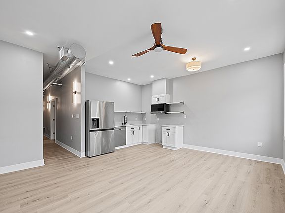 Open concept kitchen/dining/living room