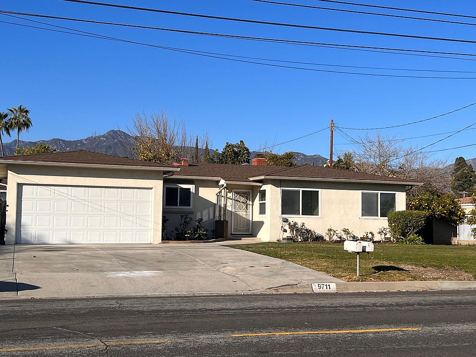 Private front and back yard with private 2 car garage. And lots of street parking if needed.