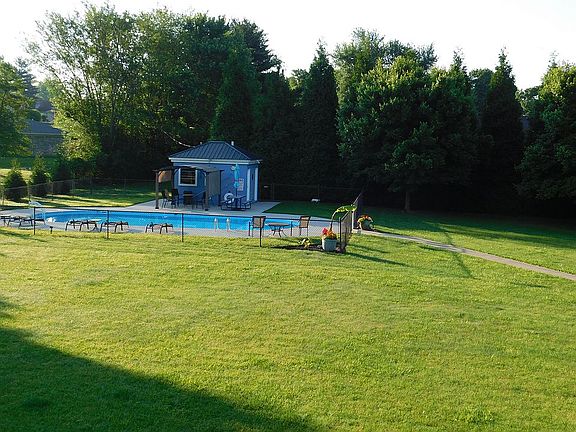 Balcony overlooks pool area