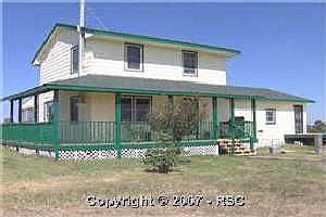 Front view,5 acres behind.Barn off to right of picture.