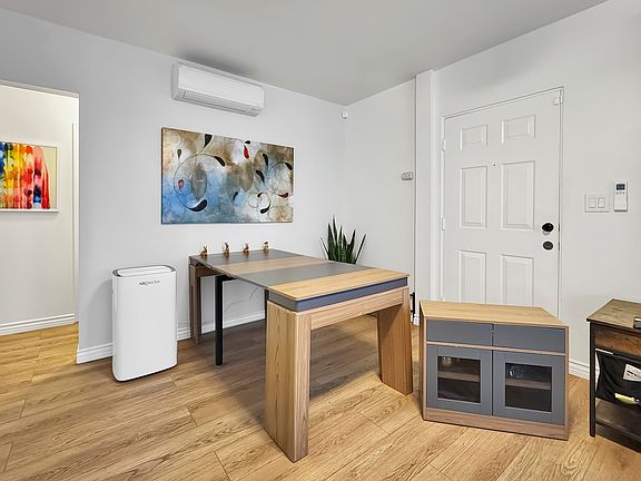 Expandable dining room table (seats 6 comfortably) with removable beverage station