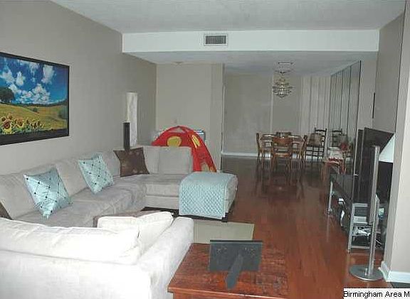 Spacious Family room wiht a great view and new hardwood floors
