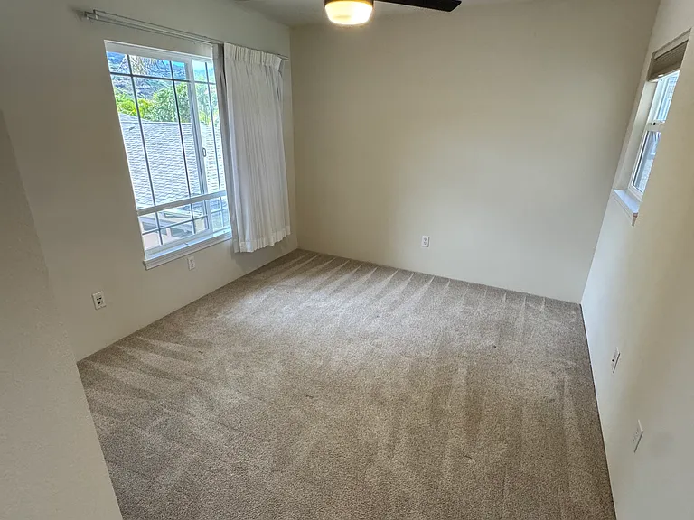 Third bedroom with new remote control ceiling fan.