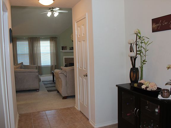 Gorgeous entry to family w/coat closet and guest bath
