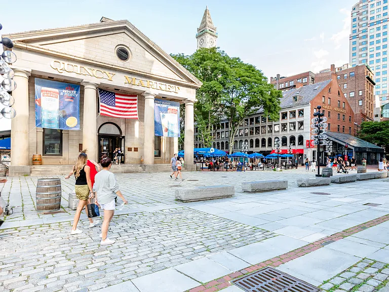 Visit the historic Quincy Market.