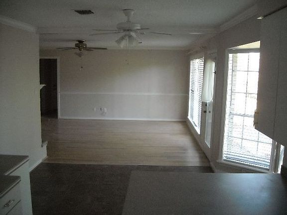 Breakfast room with bay windows open to den