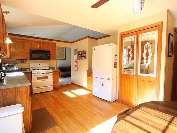 Hardwood floors in the kitchen!  New refrigerator and dishwasher, panty for plenty of storage.