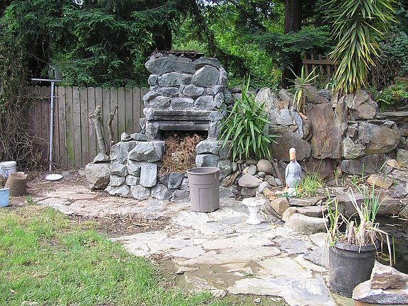 built in "manly" stone barbeque