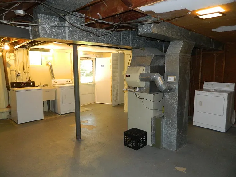 spacious utility room with washer and dryer