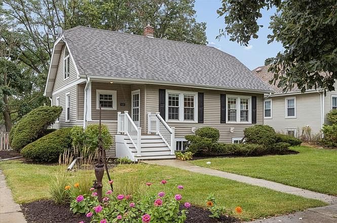 Great curb appeal! New front porch and stairs.