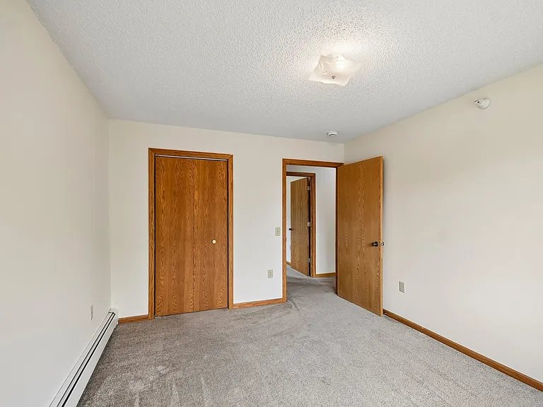 Step into the inviting interiors of Mill Pond Apartments, featuring spacious layouts and warm, neutral tones perfect for personalization. With ample closet space and cozy carpeting, this is your canvas for comfortable living. Schedule a tour today!