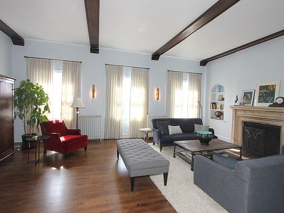 Soaring ceiling, 3 huge windows with southern exposure overlooking Mills Park and Pleasant Home.